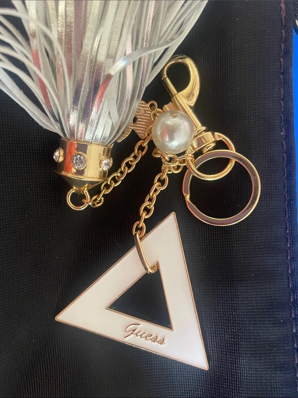 GUESS White and Gold Logo Tassel Keyring Charm